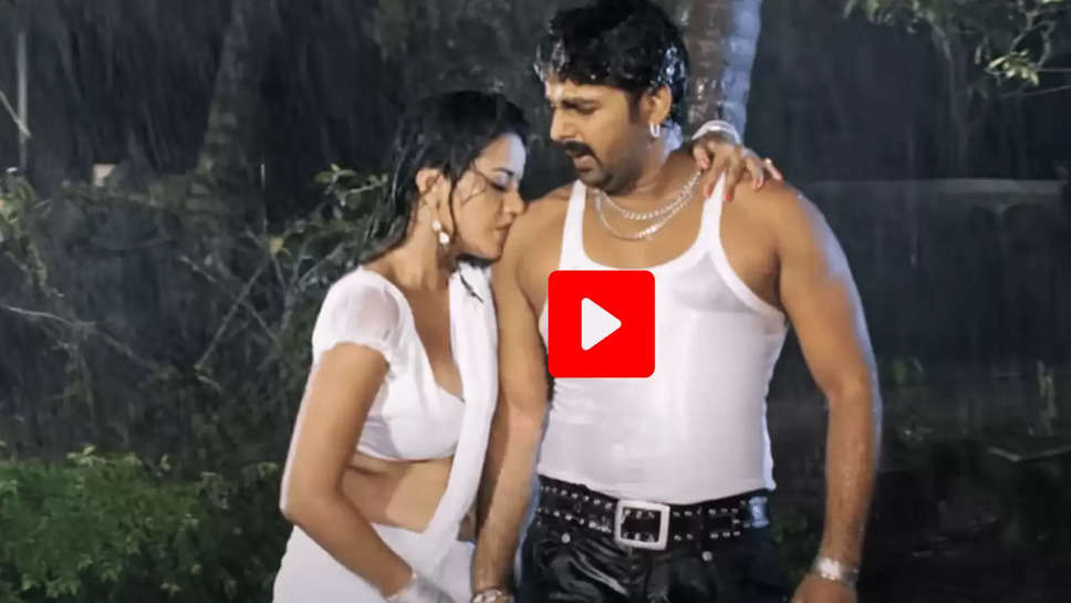 Pawan Singh and Monalisa got drenched in rain drops